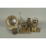 A quantity of Eastern white metal, to include a water sprinkler, three piece tea set, dishes and