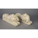 A pair of Continental white pottery lions, in the manner of Canova, 31cm wide (20