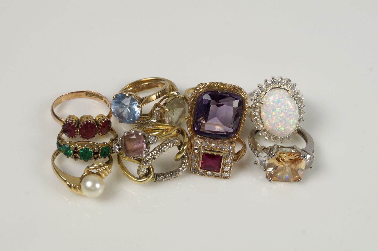 Including: a mixed-cut amethyst single stone ring, modified from a 19th century fob seal, a single-