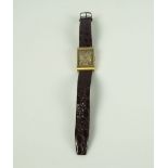 A Jaeger LeCoutre wrist watch, of rectangular form, gilt batons and hands and subsidiary seconds,