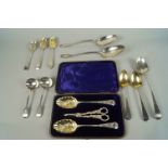 A quantity of silver spoons, to include three berry spoons, pair of sauce ladles, pair of silver