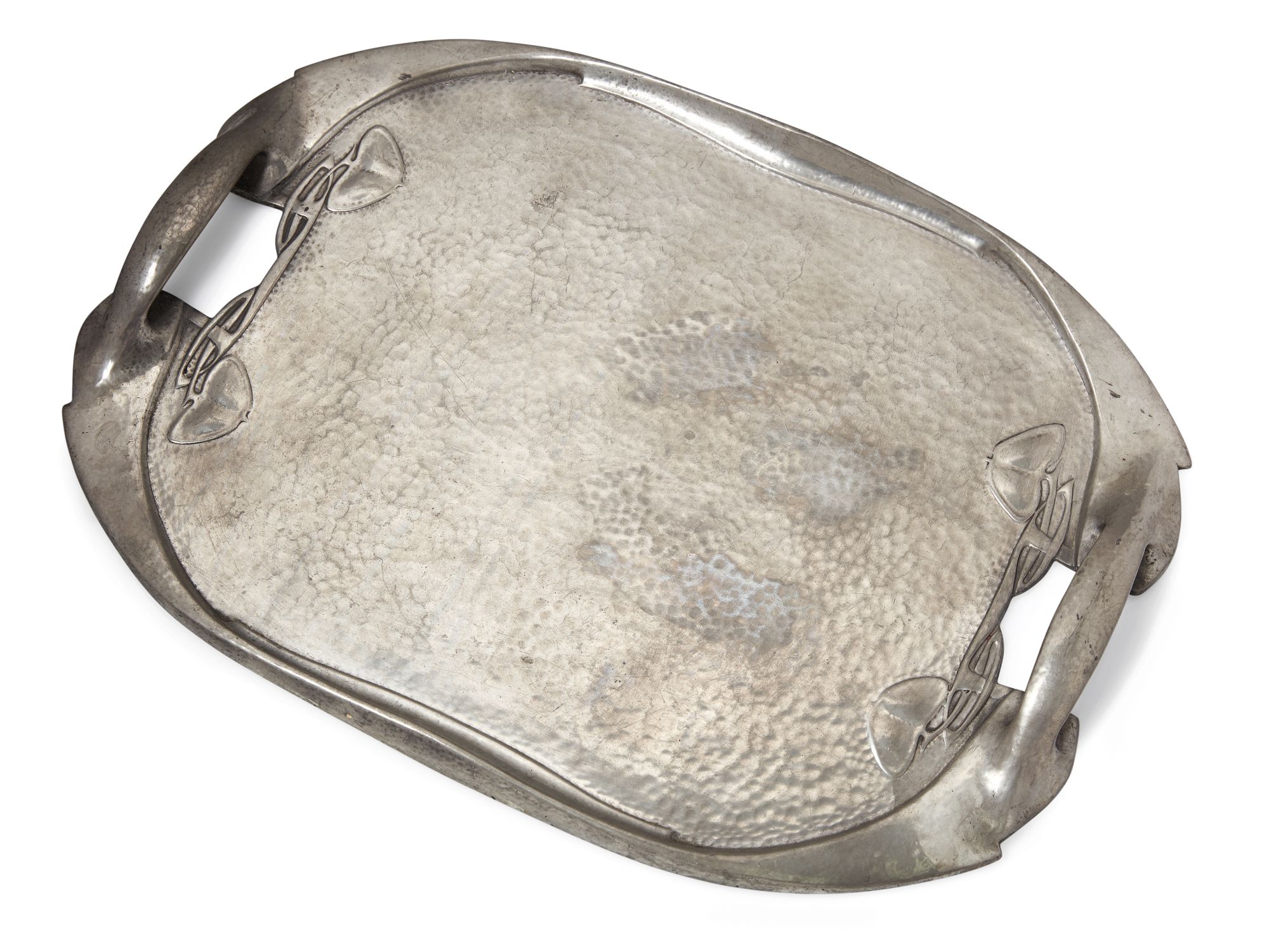 Archibald Knox (1864-1933) for Liberty & Co, a ‘Tudric’ hammered pewter twin-handled trayCirca 1905,