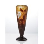 Daum, a double overlay cameo and wheel-carved glass vaseCirca 1910, wheel carved Daum Nancy with