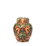 Moorcroft, a ‘Flame of the Forrest’ ceramic ginger jar and coverImpressed pottery marks, WM, © 97,