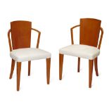 Pierre Chareau (1883-1950), a pair of ‘mf 275’ upholstered sycamore chairsCirca 1922-1924Each with