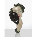 Goldscheider, a glazed ceramic wall maskCirca 1930, Printed Goldscheider, Wien, Made in Austria,