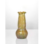 Jugendstil, an iridescent glass vase vase, possibly Fritz HeckertCirca 1900With wavy rim,