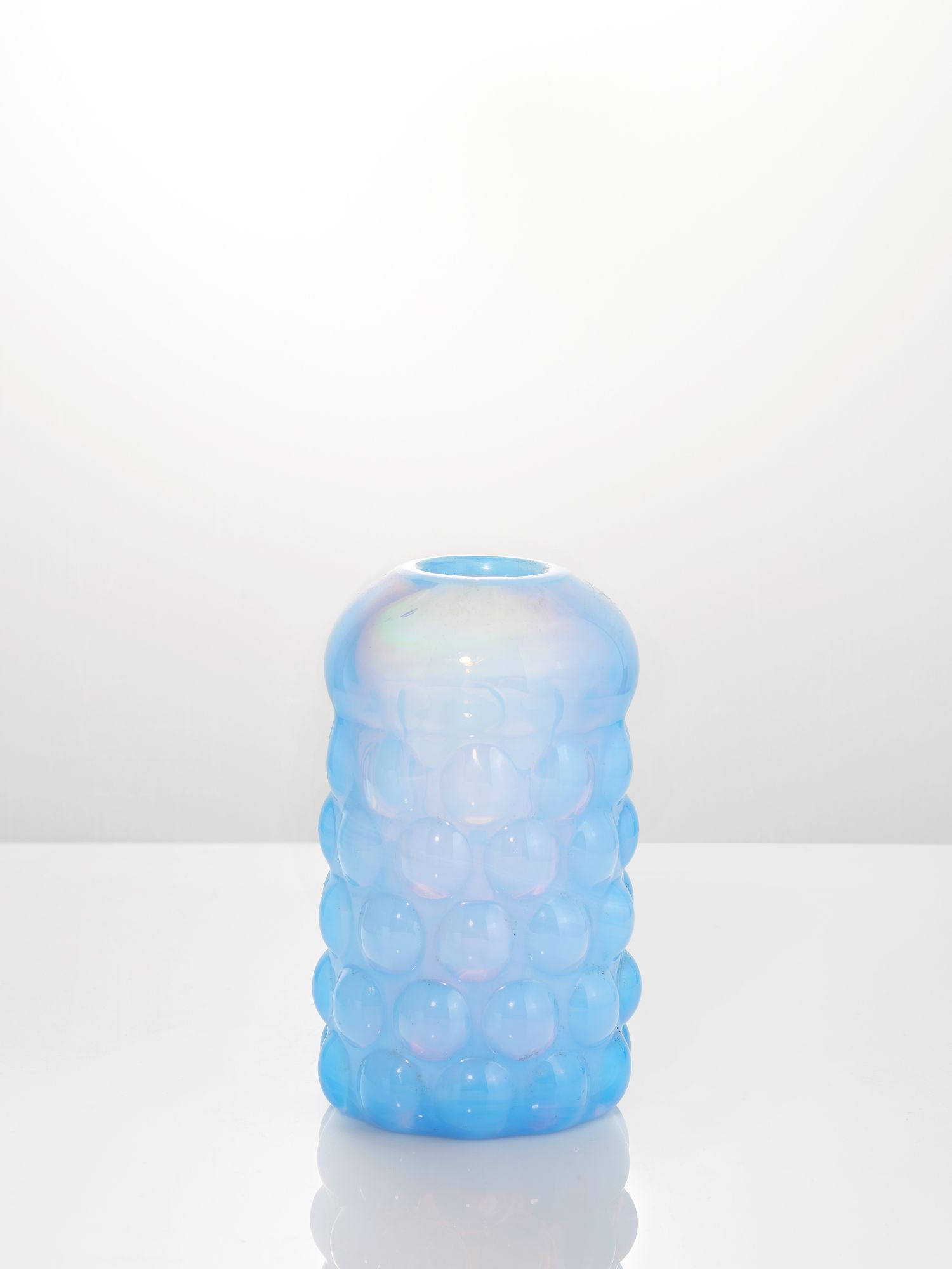 Loetz and Koloman Moser (1868-1918) Attributed, an opalescent glass vaseCirca 1900Heavy, lightly