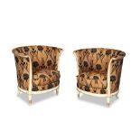 French Art Deco, a pair of carved, painted and upholstered 'Lotus' chairs in the style of Jules