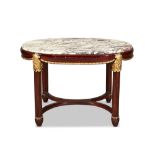 French Art Deco, a carved and part gilded marble topped centre tableCirca 1930The oval top inset