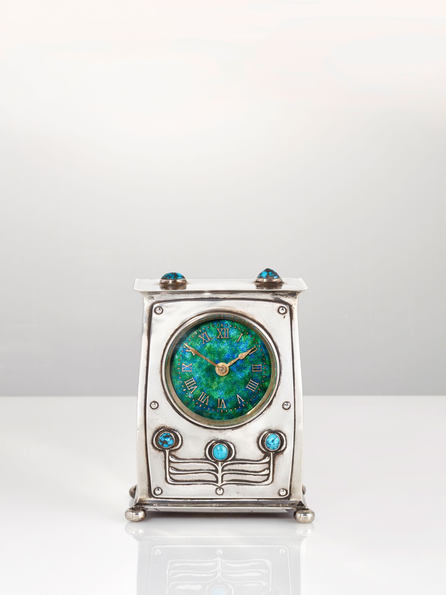 Liberty & Co, a ‘Cymric’ silver, enamel and turquoise timepieceStamped ‘Cymric’, L&Co, Birmingham