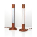 A pair of 'Modernist' copper cylinder table lamps20th CenturyWith tubular bulbs, stepped and