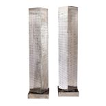 A Pair of Revolving Perforated Steel Floor LampsLate 20th CenturyOn square metal bases192 cm high,