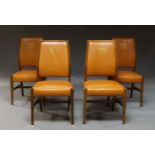 A set of four Art Deco style walnut framed chairs, mid-20th century, with padded back and seats, the
