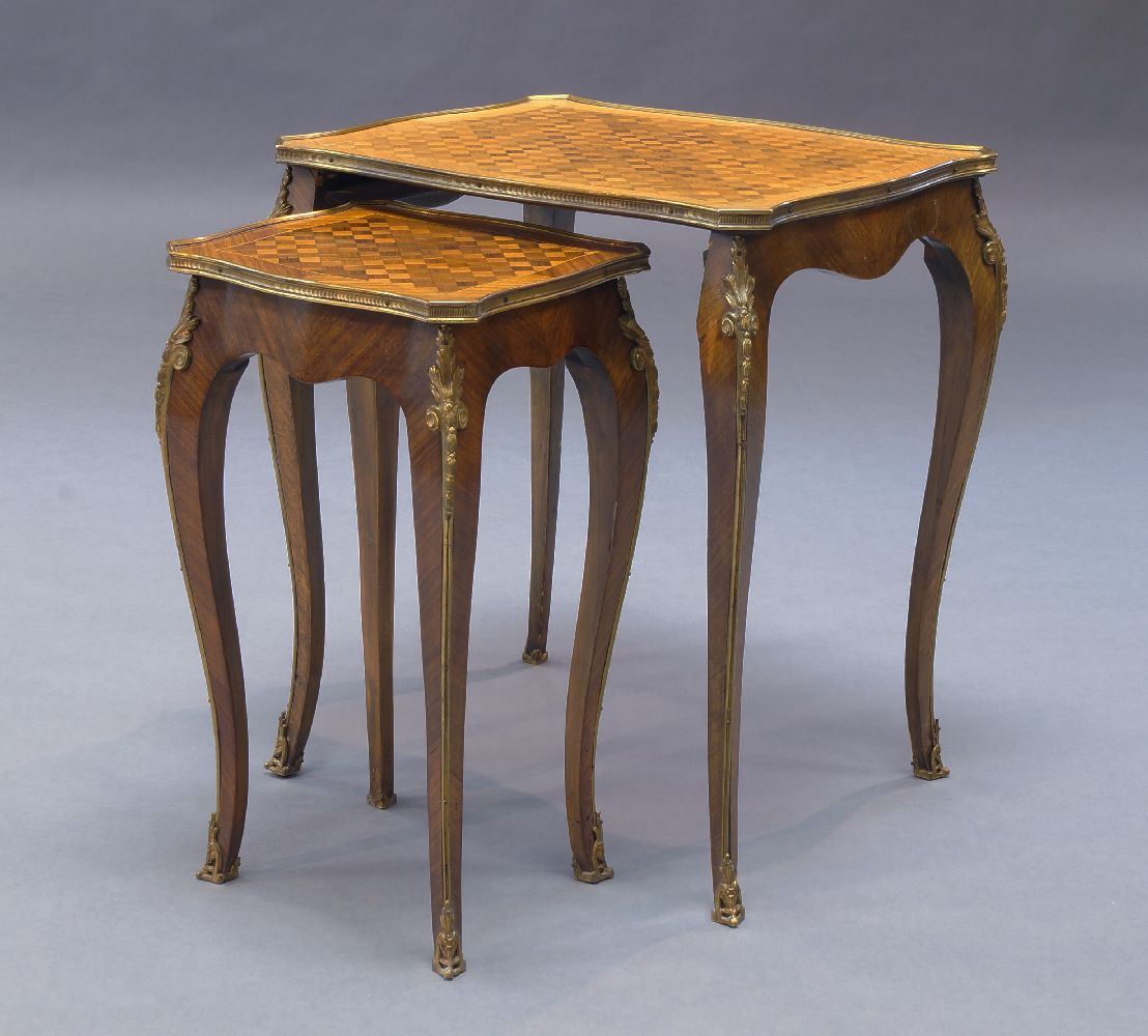 A Louis XV style kingwood nest of two tables, the shaped rectangular top with parquetry inlay, above