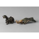 A Chinese bronze kylin, Han, standing four square with pair of stylised wings, 5cm high and a