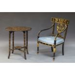 A Regency style ebonised and parcel gilt armchair, early 20th Century, the crest rail with classical