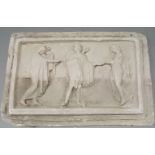 A plaster relief moulded plaque of three classical figures, early 20th century, the central figure