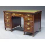 Shapland and Petter, Barnstaple, an Arts and Crafts mahogany knee hole desk, early 20th Century, the