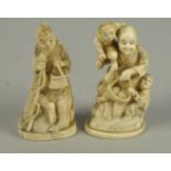 Two Japanese ivory figure groups of a man holding a fishing rod, seated on a rocky outcrop and a
