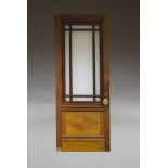 An impressive set of six mahogany and glazed gallery doors, with cast brass handles in the form of