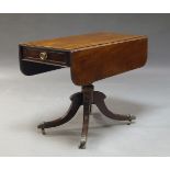 A Scottish George IV mahogany Pembroke table, with rounded rectangular top above turned central