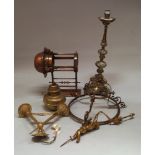 A Spanish metal alter candlestick, 19th century, 70cm high, together with a copper lantern, a late