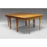 A Regency mahogany and line inlaid D-end dining table, the shaped top with reeded edge, above line