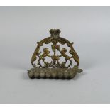A cast brass menorah, in the 19th century style, 20th century, the back plate pierced with the lions