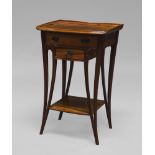 In the manner of Louis Majorelle, a walnut side table, with two drawers above undertier