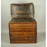 A South East Asian bamboo and shell applied casket, East Java, 43cm high x 52cm wide x 40cm deep,