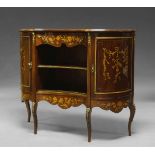 An Edwardian mahogany and marquetry inlaid cabinet, the shaped top above central inverse recess,
