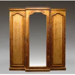 A Victorian satinwood and birds eye maple triple breakfront wardrobe, the moulded cornice, over