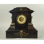 A French black slate mantel clock, late 19th/early 20th century, of architectural form applied