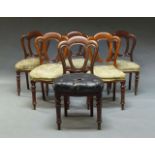 A set of six Victorian dining chairs, with pierced and carved backrests, five with floral