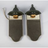 A pair of green wall lights, late 20th century, in the form of girandoles, with arched mirrored