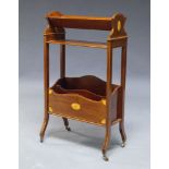 An Edwardian mahogany and line inlaid magazine rack, with v shaped book rack, above single shelf