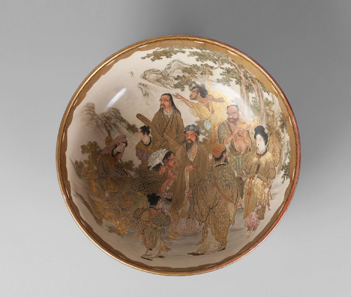 A large Japanese Satsuma bowl, Meiji period, finely painted to the interior with various deities