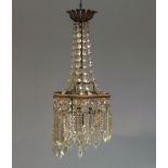 A cut glass and lustre hung chandelier, 20th century, with two tiers of lustres hung from a