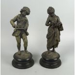 A pair of spelter figures of a girl and boy representing literature and writing, late 19th/early