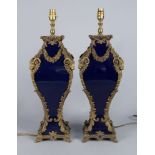 A pair of French taste blue porcelain and bronzed metal mounted lamps, late 20th century, deco