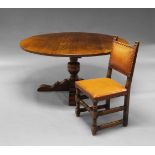A Titchmarsh & Goodwin oak breakfast table, 2nd half 20th Century, the circular top above central