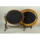 A mahogany swing frame mirror, in the George III style, 48cm high, together with an oval gilt