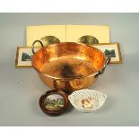 A copper twin handled preserving pan, 42cm diameter, together with Victorian Pratt ware pot lid, a