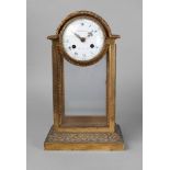 A French gilt bronze mantel clock by Ferdinand Berthoud, 19th century, the case of arched design