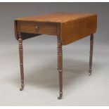A Victorian mahogany Pembroke table, with one frieze drawer and opposing faux drawer, raised on