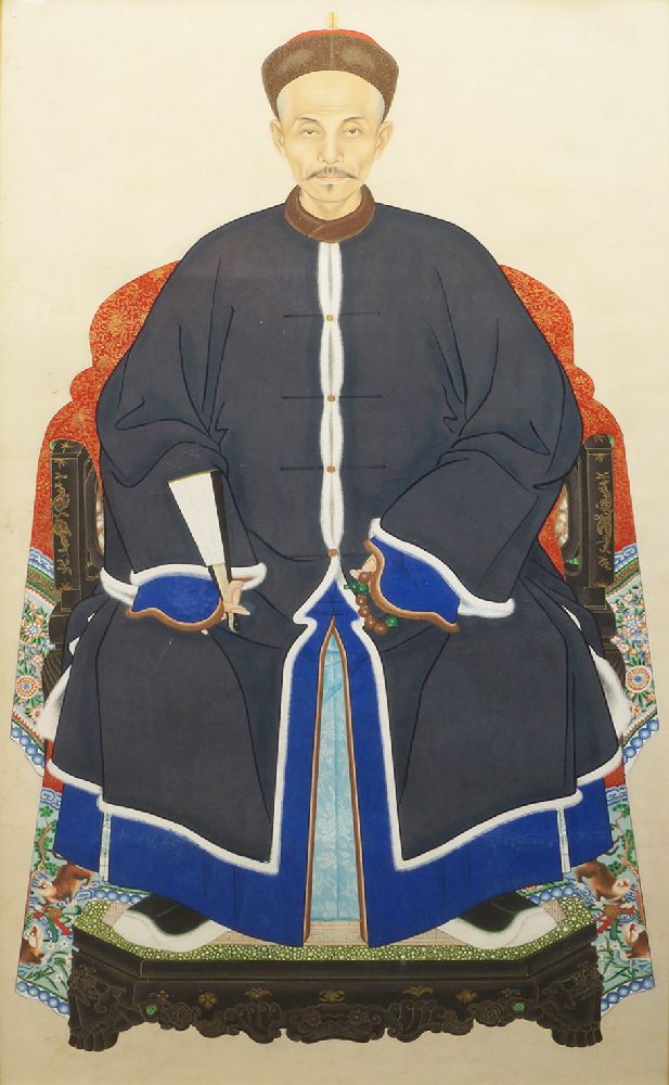 A Chinese ancestor portrait of a seated man, 20th century, watercolour on paper, framed and