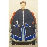 A Chinese ancestor portrait of a seated man, 20th century, watercolour on paper, framed and