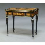A Victorian ebony, burr walnut and marquetry inlaid card table, the shaped fold over top inlaid with