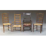 A pair of Macclesfield ladder back chairs, with rush seats, together with a further Macclesfield